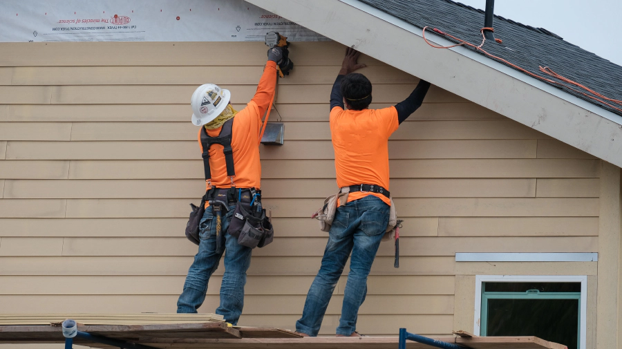 contractors during a siding installation blue springs mo